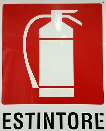 signal sign against fire extinguisherの写真素材