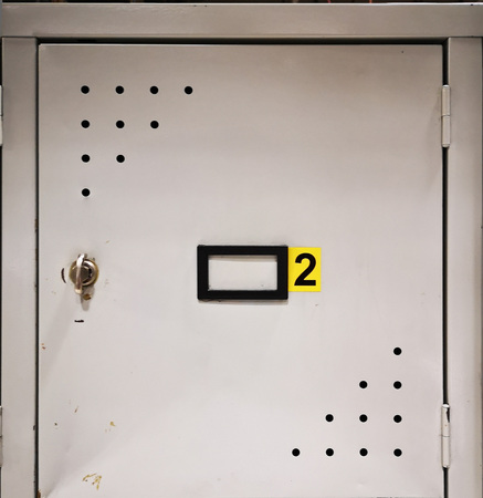 work cabinet with the number two closed with the padlockの写真素材