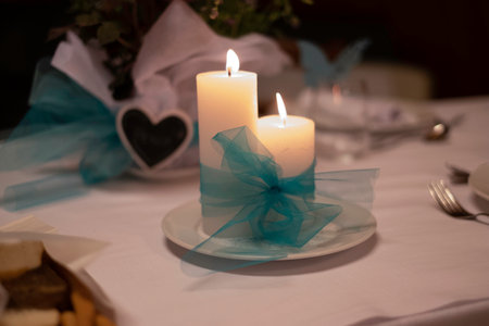 festively decorated tables for a wedding in full Italian traditionの写真素材