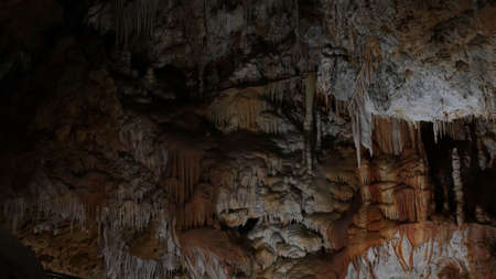 the beautiful stalactites and stalagmites created by the water in the rock: the caves of Borgio Verezzi in Liguriaの写真素材
