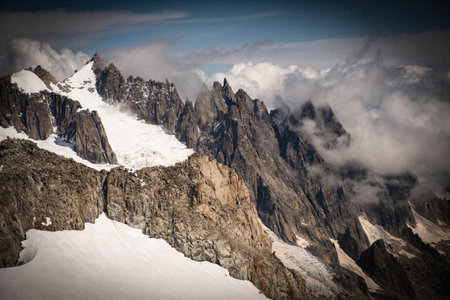 Mountains in the clouds. Dolomites, Italy. Toned.の写真素材