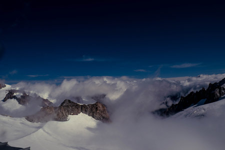 Mountains in the clouds. Caucasus, Dombay, Russiaの写真素材
