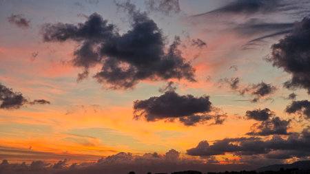Cloudscape, Colored Clouds at Sunset near the Ocean on a Cloudy Day