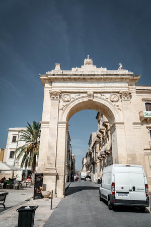 The Porta Reale is the symbol of the entrance to the city of Noto. The project of the Porta Reale began in 1838 when Noto learned of the arrival of King Ferdinand II of Bourbon, knの写真素材