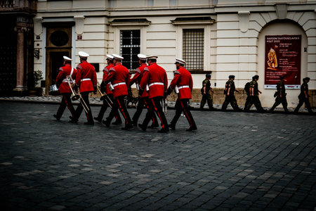 Several Prague Castle Guardsmen parade in front of the castle on a summer's dayの写真素材