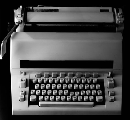 old post-war typewriter with black and white keysの写真素材