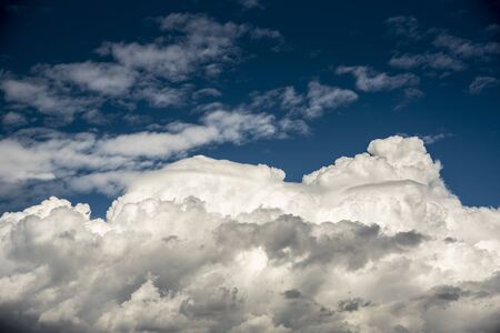 Different types of clouds threatening storms and rainの写真素材