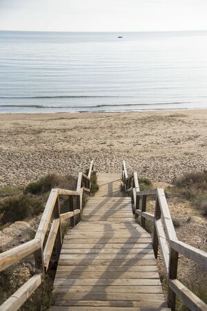 Wooden stairs to the beach
