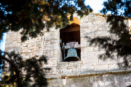 Old bell on the wall of the castle of Kotor, Montenegroの写真素材
