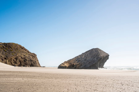 Rocks and sand on the beach in Mediterranean coast, Cabo de Gata, Spain.の写真素材