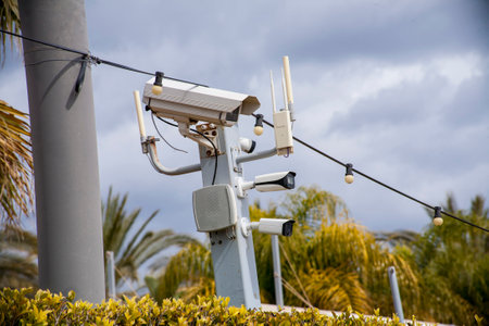 Security camera on the roof of a building in the tropics.