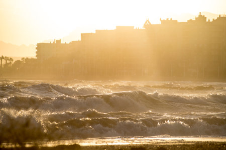 Sunset over the sea in the city of Alicante, Spainの写真素材
