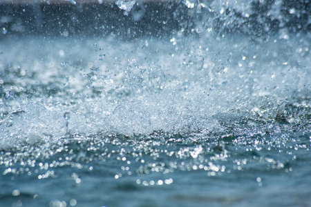 Splashes of water from the fountain. Backgroundの写真素材