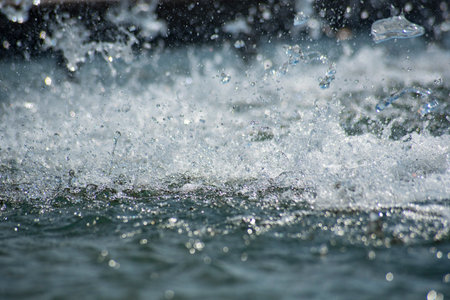 splashes of water on a dark background. close-up.の写真素材