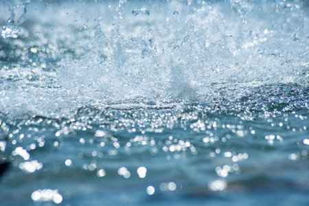 Water splashes on the background of the sea. Splash of water.の写真素材