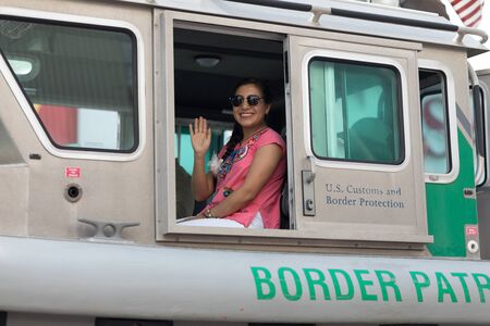 Brownsville, Texas, USA - February 24, 2018, Grand International Parade is part of the Charro Days Fiesta - Fiestas Mexicanas, A bi-national festival between USA and Mexico.のeditorial素材