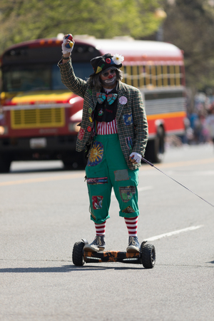 Washington, D.C., USA - April 14, 2018 Clowns going down the street in the 2018 National Cherry Blossom Paradeのeditorial素材