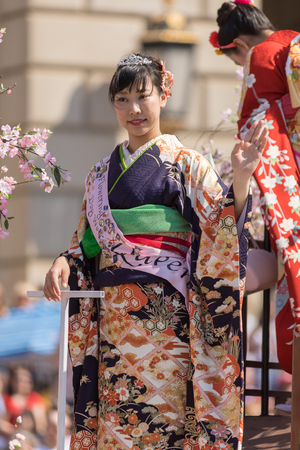 Washington, D.C., USA - April 14, 2018 Cherry Blossom Queen in the 2018 National Cherry Blossom Paradeのeditorial素材