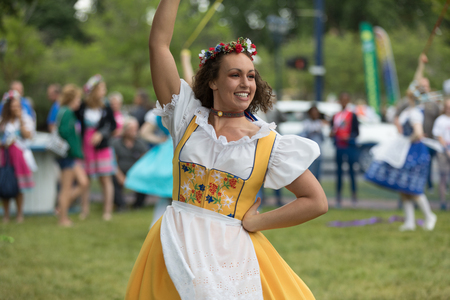 Frankenmuth, Michigan, USA - June 10, 2018 Members from the Frankenmuth dance center perform the maypole dance during the Bavarian Festival.のeditorial素材