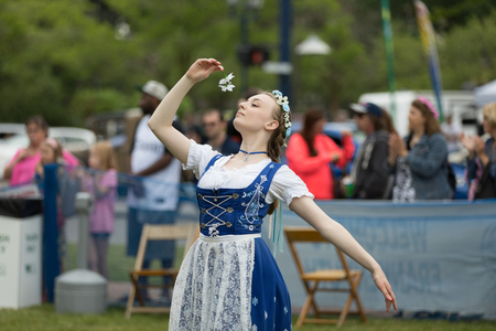 Frankenmuth, Michigan, USA - June 10, 2018 Members from the Frankenmuth dance center perform the maypole dance during the Bavarian Festival.のeditorial素材