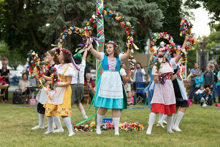 Frankenmuth, Michigan, USA - June 10, 2018 Members from the Frankenmuth dance center perform the maypole dance during the Bavarian Festival.のeditorial素材