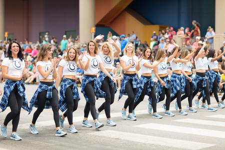 Indianapolis, Indiana, USA - May 26, 2018,  The Colts Cheerleaders walk down the street at  the Indy 500 Paradeのeditorial素材
