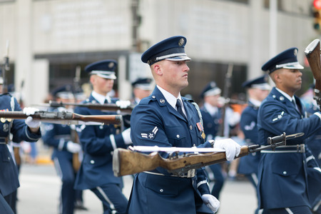 Indianapolis, Indiana, USA - May 26, 2018, Members of the US Air Force march in formation with rifles down the road at the Indy 500 Paradeのeditorial素材