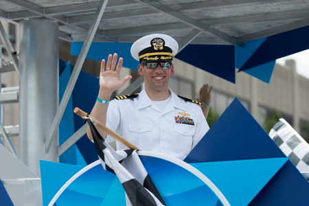 Indianapolis, Indiana, USA - May 26, 2018, A float of the 500 festival carries members of the US Navy, down the road, at the Indy 500 Paradeのeditorial素材