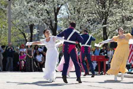 Chicago, Illinois, USA - May 05, 2018 Members of Polonia, polish folk song and dance ensemble, wearing traditional clothing, perform polish traditional dancing at the Grant Park, after the Polish Constitution Day Parade.のeditorial素材