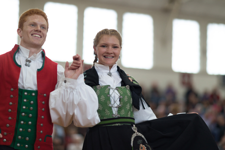 Stoughton, Wisconsin, USA - May 19, 2018 The Stoughton Norwegian Dancers, wearing traditional clothing from norway, perform traditional dances at the Community Building Performance, during the Syttende Mai Stoughton festival, Norwegian Constitution Day.のeditorial素材