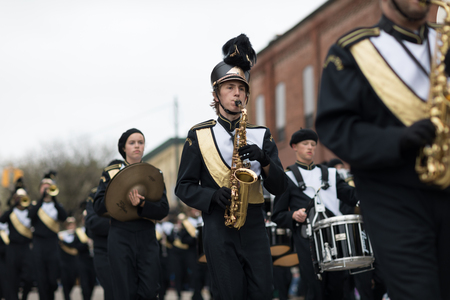 Holland, Michigan, USA - May 12, 2018 Members of the Hamilton High School marching band perform at the Muziek Parade, during the Tulip Time Festivalのeditorial素材