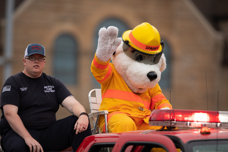 Peru, Indiana, USA - July 21, 2018 Sparky the mascot of the Mexico Fire Department at the Circus City Festival Paradeのeditorial素材