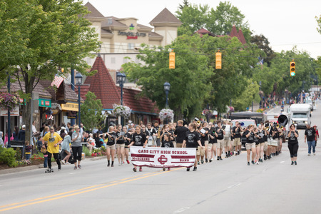 Frankenmuth, Michigan, USA - June 10, 2018 Members of the Cass City High School Marching Band perform at the Bavarian Festival Parade.のeditorial素材