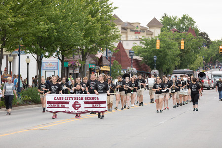 Frankenmuth, Michigan, USA - June 10, 2018 Members of the Cass City High School Marching Band perform at the Bavarian Festival Parade.のeditorial素材