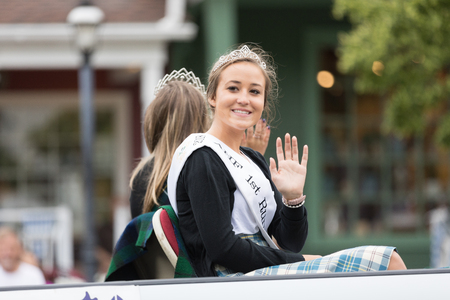 Frankenmuth, Michigan, USA - June 10, 2018 Beauty Queens ridding on the back of a truck going down the road at the Bavarian Festival Parade.のeditorial素材