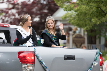 Frankenmuth, Michigan, USA - June 10, 2018 Beauty Queens ridding on the back of a truck going down the road at the Bavarian Festival Parade.のeditorial素材