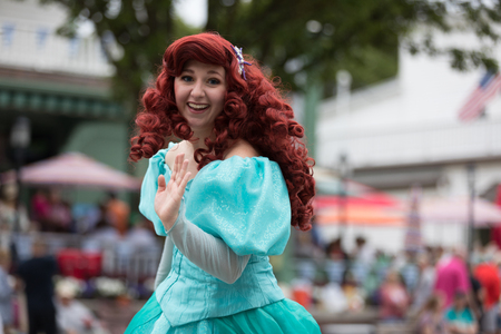 Frankenmuth, Michigan, USA - June 10, 2018 Members of Everafter West Michigan dress up as disney princess at the Bavarian Festival Parade.のeditorial素材
