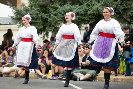 Whiting, Indiana, USA - July 28, 2018 Men and women wearing traditional slovak clothing perform traditional slovak dances at the Pierogi Festのeditorial素材