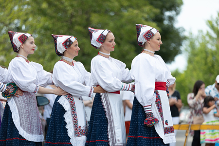Whiting, Indiana, USA - July 28, 2018 Men and women wearing traditional slovak clothing perform traditional slovak dances at the Pierogi Festのeditorial素材