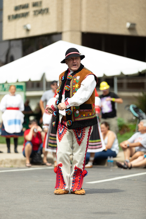 Whiting, Indiana, USA - July 28, 2018 Men and women wearing traditional slovak clothing perform traditional slovak dances at the Pierogi Festのeditorial素材
