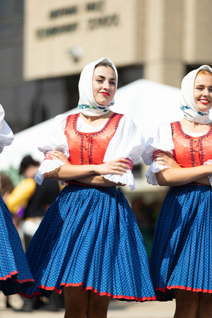 Whiting, Indiana, USA - July 28, 2018 Men and women wearing traditional slovak clothing perform traditional slovak dances at the Pierogi Festのeditorial素材