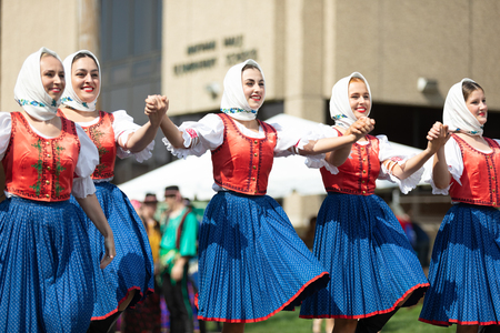 Whiting, Indiana, USA - July 28, 2018 Men and women wearing traditional slovak clothing perform traditional slovak dances at the Pierogi Festのeditorial素材