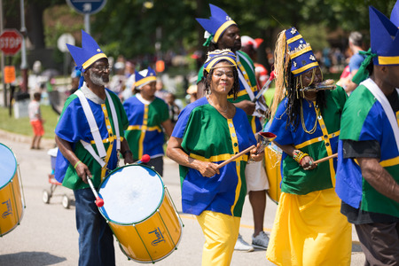 Cleveland, Ohio, USA - June 9, 2018 African american man playing the drum At the abstract art...