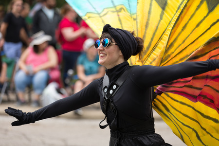 Cleveland, Ohio, USA - June 9, 2018 woman dress up as a butterfly at the abstract art festival Parade The Circleのeditorial素材
