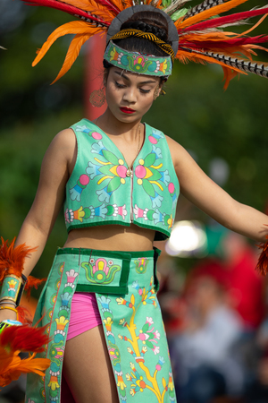 Milwaukee, Wisconsin, USA - September 8, 2018 The Indian Summer Festival: Men women and children members of the Dance Academy of Mexico performing Aztec Danceのeditorial素材