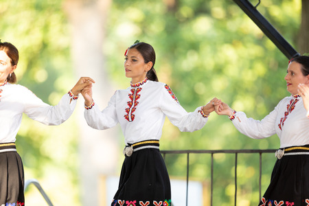 St. Louis, Missouri, USA - August 26, 2018: The Festival of Nations, Women from the Bulgarian School of St. Louis perfrom traditional Bulgarian dancesのeditorial素材