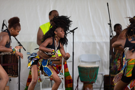 St. Louis, Missouri, USA - August 26, 2018: The Festival of Nations, Men women and children from...