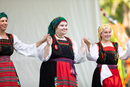 St. Louis, Missouri, USA - August 26, 2018: The Festival of Nations, Young men and women from the Greek Dancers of The Assumption Greek Orthodox Church perform traditional Greek dancesのeditorial素材