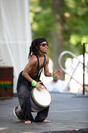 St. Louis, Missouri, USA - August 26, 2018: The Festival of Nations, Men women and children from Spirit of Angela perform traditional African dances.のeditorial素材