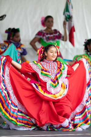 St. Louis, Missouri, USA - August 26, 2018: The Festival of Nations, Women and children from the Mexican Dance Ministerio Guadalupe perfrom traditional Mexican dances.のeditorial素材